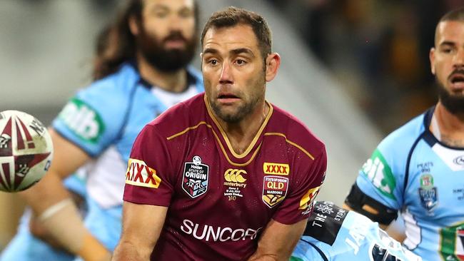 BRISBANE, AUSTRALIA - JULY 12: Cameron Smith of the Maroons is tackled during game three of the State of Origin series between the Queensland Maroons and the New South Wales Blues at Suncorp Stadium on July 12, 2017 in Brisbane, Australia. (Photo by Cameron Spencer/Getty Images)