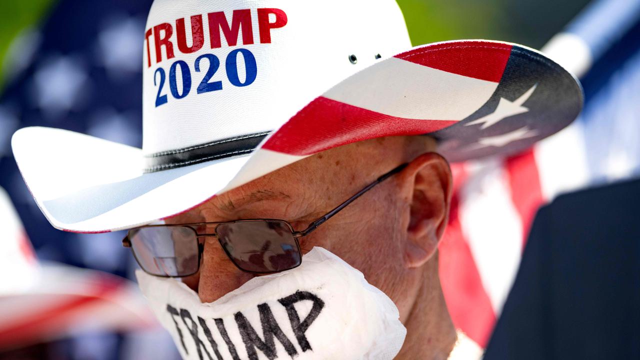 A man wears a pad over his face as he protests the stay-at-home orders in Sacramento, California. Picture: Josh Edelson/AFP