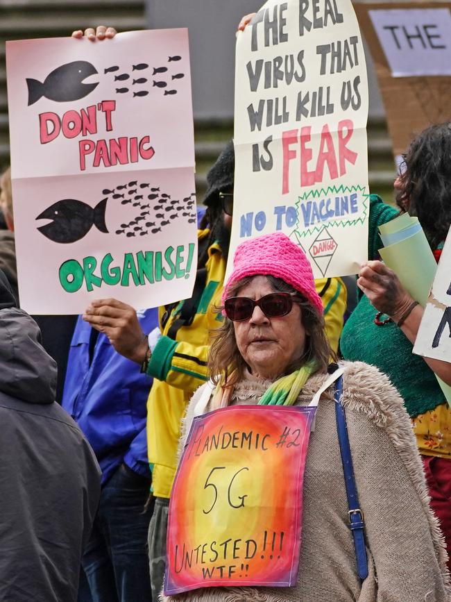 5G and vaccine conspiracies were in force at the protest. Picture: AAP Image/Scott Barbour