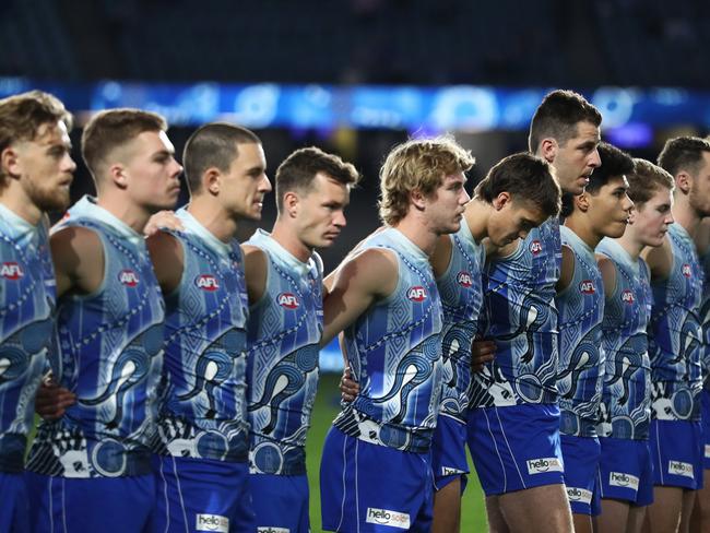 MELBOURNE, AUSTRALIA - MAY 21: Kangaroos line up ahead of the round 10 AFL match between the North Melbourne Kangaroos and the Melbourne Demons at Marvel Stadium on May 21, 2022 in Melbourne, Australia. (Photo by Mike Owen/AFL Photos/via Getty Images)