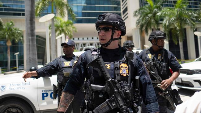 Law enforcement officers stand outside the Wilkie D. Ferguson Jr. United States Federal Courthouse in Miami during Donald Trump’s arraignment. Picture: AFP.