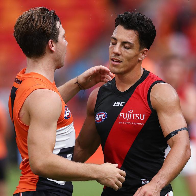 Dylan Shiel with Toby Greene after facing off against his former club.