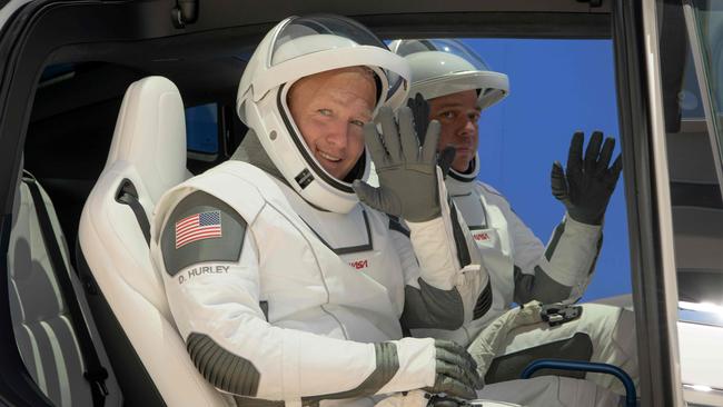 Douglas Hurley and and Robert Behnken while ride in a Tesla Model X to Launch Complex 39A. Picture: SpaceX via AFP