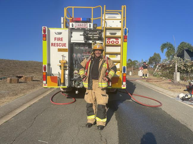 Whitsunday Fire Station Officer Rees May was on scene with eight other fireys to battle a car and house fire on Altmann Ave. Photo: Estelle Sanchez