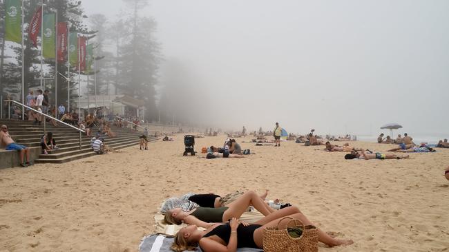 Sea fog engulfs the Northern Beaches at Manly Beach. Picture: (AAP IMAGE / Troy Snook)