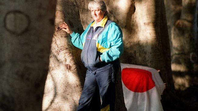 Dawn Fraser in 1995 with the iconic Japanese flag.