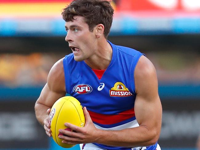 BRISBANE, AUSTRALIA - OCTOBER 03: Josh Dunkley of the Bulldogs in action during the 2020 AFL Second Elimination Final match between the St Kilda Saints and the Western Bulldogs at The Gabba on October 03, 2020 in Brisbane, Australia. (Photo by Michael Willson/AFL Photos via Getty Images)