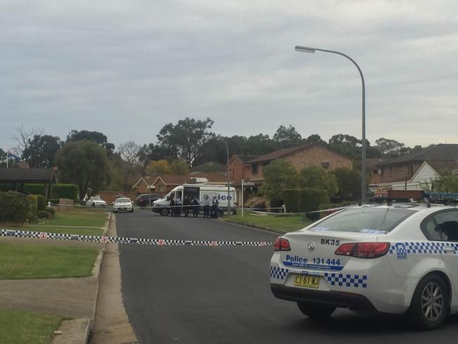 Police at the scene of the Milperra home where the body of Anne Rogers was found. Picture: James Taylor