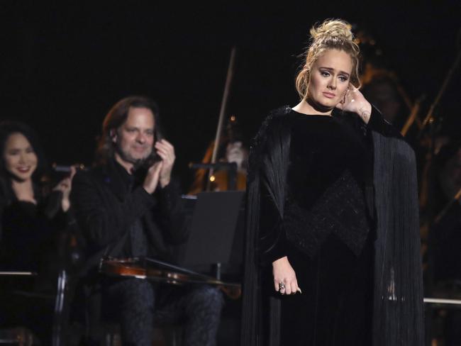 Adele looked despondent at the end of the song, despite a standing ovation. Picture: Matt Sayles/Invision/AP