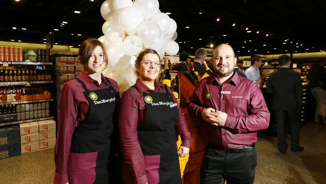 Staff members, from left, Shell, Sarah and store manager Sam Mansfield at the store’s opening on Friday night. Picture: MATT THOMPSON