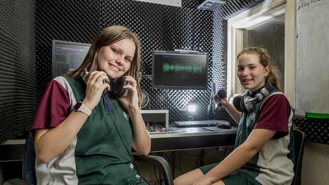 Pacific Pines High School students  Logan Picketts and Kiyah Bourke get to work in the studio. Picture: Jerad Williams