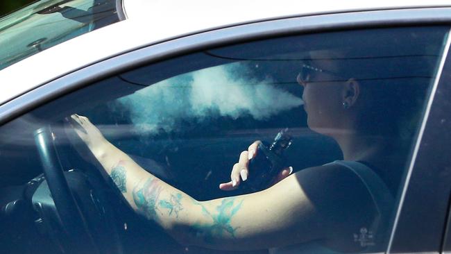 Vaping while driving.Surfers Paradise on the Gold Coast.** NO BYLINE **