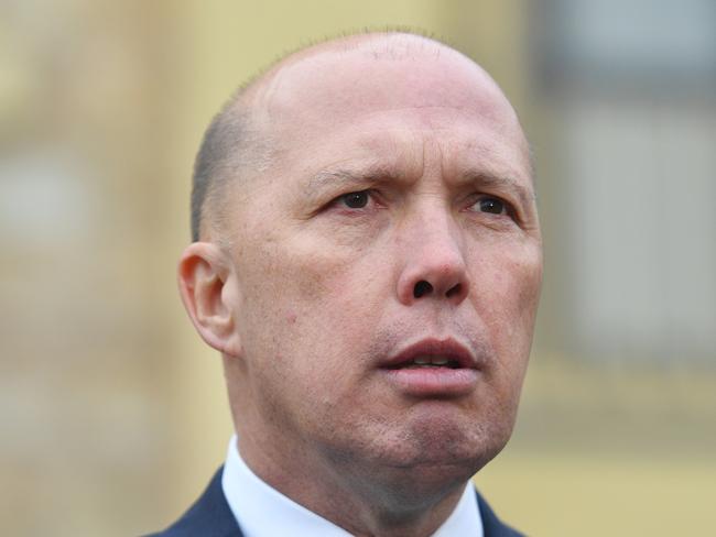 Minister for Immigration Peter Dutton speaks to the media at Mt Lofty House in Crafers, Adelaide, Tuesday, July 24, 2018. Peter Dutton is with Georgina Downer campaigning in the lead up to the Mayo By-election on Saturday. (AAP Image/David Mariuz) NO ARCHIVING