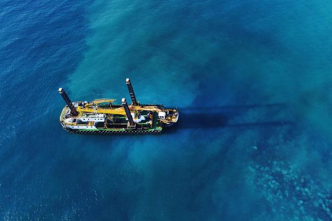 The giant Rock Dredge works on the Artificial reef just offshore from Nineteenth Ave Palm Beach. Picture Glenn Hampson