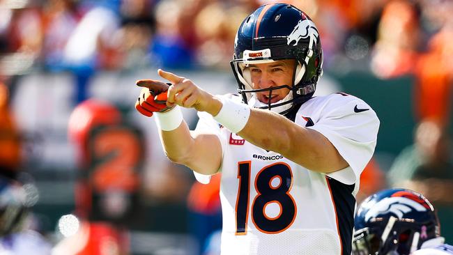 Peyton Manning yells to teammates in the second quarter.