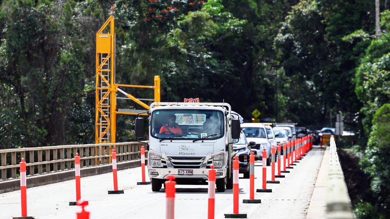 The Queensland Government has announced $450m to fund a new bridge for the Kennedy Highway over the Barron River near the Tablelands town of Kuranda. Traffic has been reduced to a single lane of traffic intermittently on the existing bridge since a load limit was introduced in 2020. Picture: Brendan Radke