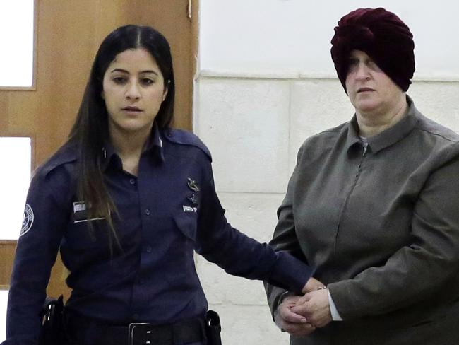 Australian Malka Leifer, right, is brought to a courtroom in Jerusalem. Picture: AP