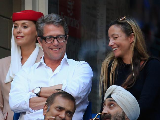 Hugh Grant watches as Lucas Pouille of France plays against Rafael Nadal of Spain during their fourth round Men’s Singles match on Day Seven of the 2016 US Open at the USTA Billie Jean King National Tennis Center on September 4, 2016. Picture: Getty