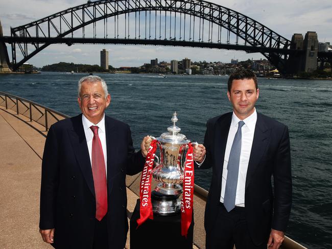 Western Sydney Wanderers Chairman Paul Lederer holds the FA Cup with Sydney FC Chairman Scott Barlow. Picture: Brett Costello