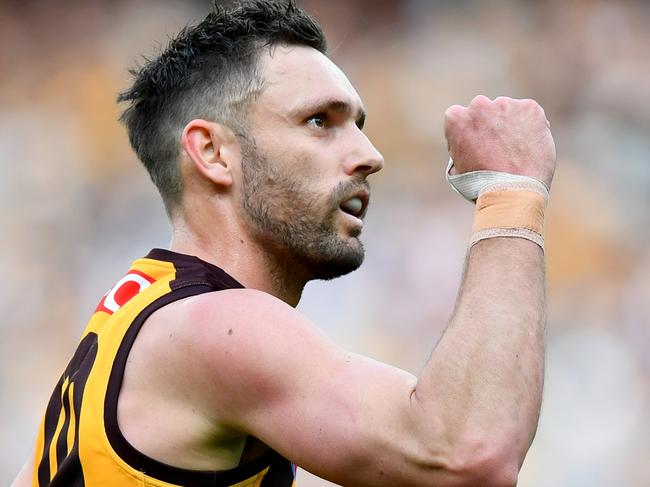 MELBOURNE, AUSTRALIA - AUGUST 18: Jack Gunston of the Hawks celebrates kicking a goal during the round 23 AFL match between Hawthorn Hawks and Richmond Tigers at Melbourne Cricket Ground, on August 18, 2024, in Melbourne, Australia. (Photo by Josh Chadwick/AFL Photos/via Getty Images)