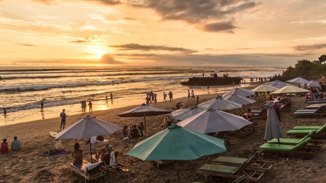 The sunset over Canggu beach, north of Kuta and Seminyak, in Bali.