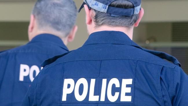 A Top End family claims police questioned a crying 14-year-old student over a crime she did not commit and stopped her principal from calling her parents, in a potential violation of the Youth Justice Act. Picture: Glenn Campbell