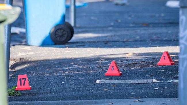 Evidence makers are placed in Walton St, Kew, where the stabber was shot dead. Picture: Jake Nowakowski