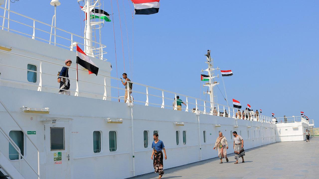 A picture taken during an organised tour by Yemen's Houthi rebels (on board) on November 22, 2023, shows the Galaxy Leader cargo ship, seized by Houthi fighters, docked in a port on the Red Sea in the Yemeni province of Hodeida. Picture: AFP