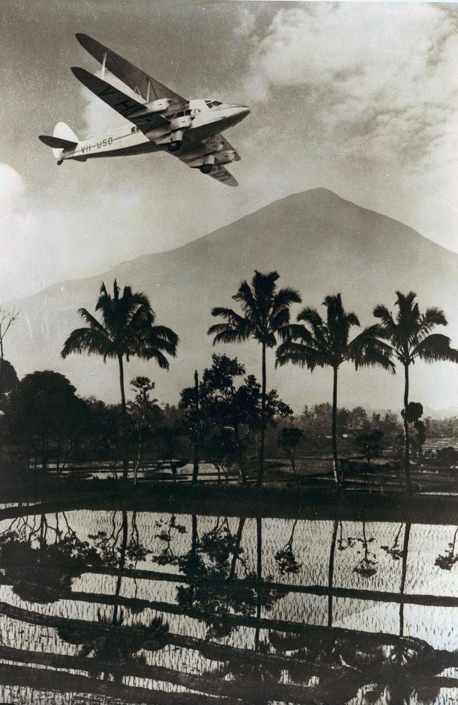 Publicity montage image showing a Qantas DH86 airliner over Java enroute to Singapore.