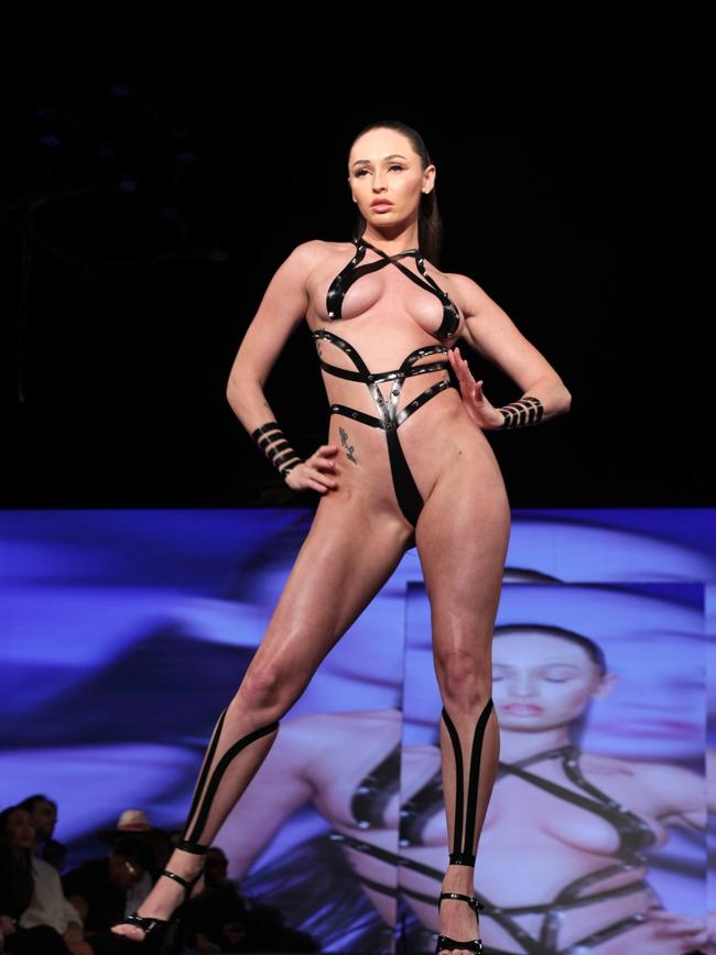 Mr Alvarez masterfully uses tape to accentuate the natural curves of a woman’s body. Picture: Black Tape Project Fashion Show BACKGRID Australia