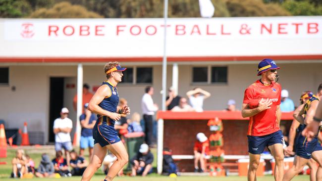 Jordan Dawson running through the middle at Robe Sports and Recreation Reserve. Picture: Harrison Mielke/ AFC