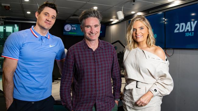 Hughes moved to Sydney to help the 2DAY FM breakfast show with Ed Kavalee (left) and Erin Molan (right).