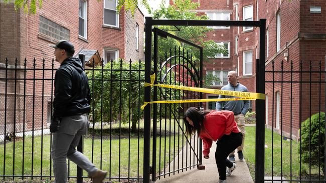Law enforcement officials from the FBI, Joint Terrorism Task Force and Chicago Police participate in a search of the apartment where shooting suspect Elias Rodriguez lived in Chicago, Illinois. Picture: Scott Olson/Getty Images/AFP