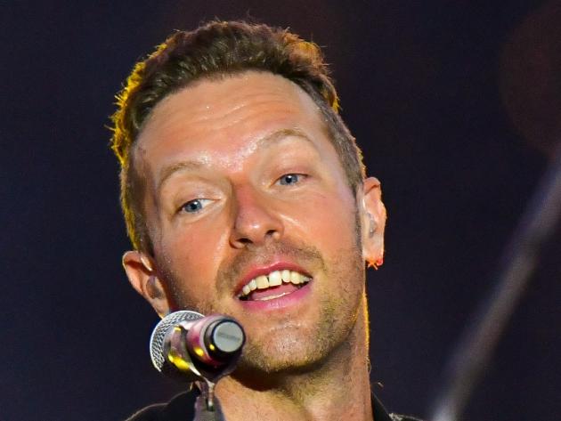 NEW YORK, NEW YORK - JUNE 17:  Chris Martin of Coldplay performs during pre-taping of the Macy's 4th of July Firework Show at Hunter's Point South Park on June 17, 2021 in New York City. (Photo by James Devaney/GC Images)