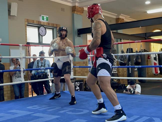 Rob Whittaker and Jai Opetaia spar in Sydney on Friday. Picture: Brendan Bradford