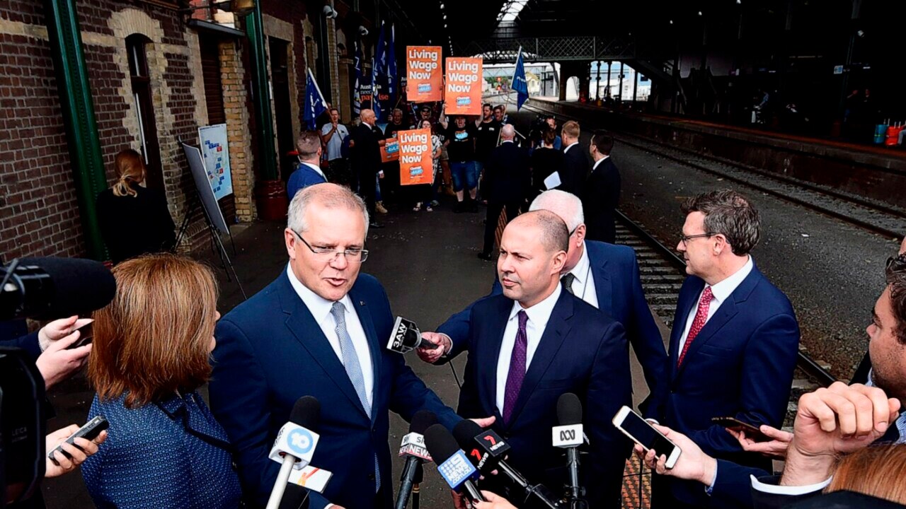 Protesters crash Scott Morrison's fast rail news conference