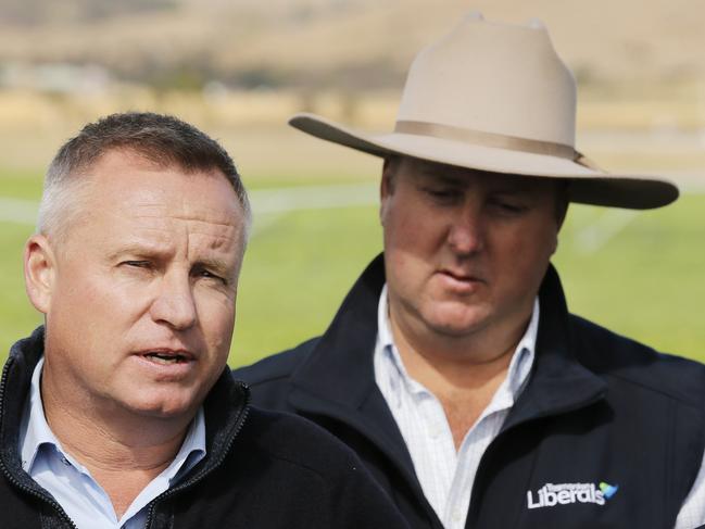 John Tucker, right, with Deputy Premier Jeremy Rockliff during the 2018 election campaign. Picture: MATHEW FARRELL