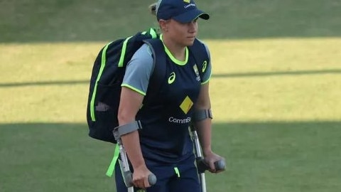 Australian captain Alyssa Healy on crutches