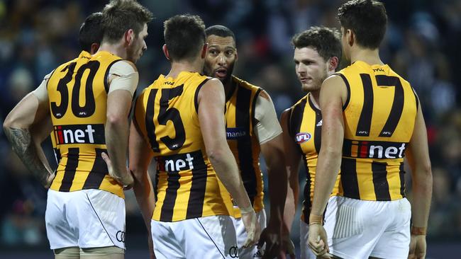 Hawthorn defenders tired to regroup after a hot start by the Power. Picture: Sarah Reed