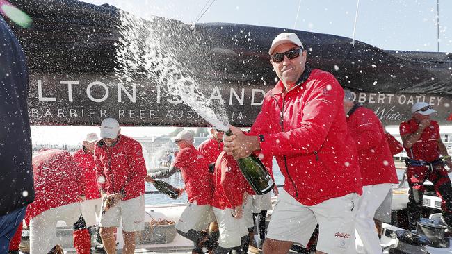 Skipper Mark Richards celebrates. Wild Oats XI, skippered by Mark Richards, claims a ninth line honours victory in the 2018 Sydney to Hobart Yacht Race. Picture: RICHARD JUPE