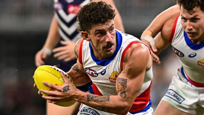 PERTH, AUSTRALIA - APRIL 21: Tom Liberatore of the Bulldogs looks for an option during the 2023 AFL Round 06 match between the Fremantle Dockers and the Western Bulldogs at Optus Stadium on April 21, 2023 in Perth, Australia. (Photo by Daniel Carson/AFL Photos via Getty Images)