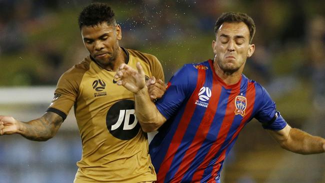 The Wanderers’ Kwame Yeboah (left) and the Jets’ Ben Kantarovski in action on Saturday night. Picture: AAP