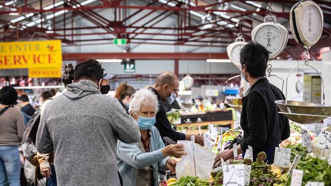 Shoppers loading up on some bargains at Queen Victoria Market. Picture: NCA NewsWire/Sarah Matray