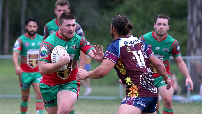 Mitch Spackman looks to defend away Ormeau’s Parahi Wilson. Picture: Mike Batterham