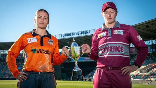 Emma Manix-Geeves from the Greater Northern Raiders and Hollie Armitage (Clarence) with the CTPL women’s Kookaburra Cup trophy. Picture: Alastair Bett.