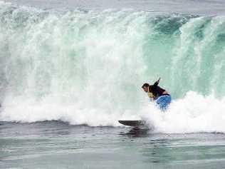 Huge swells and encroaching seas make expensive beachfront dwellings vulnerable. . Picture: Craig Sadler 