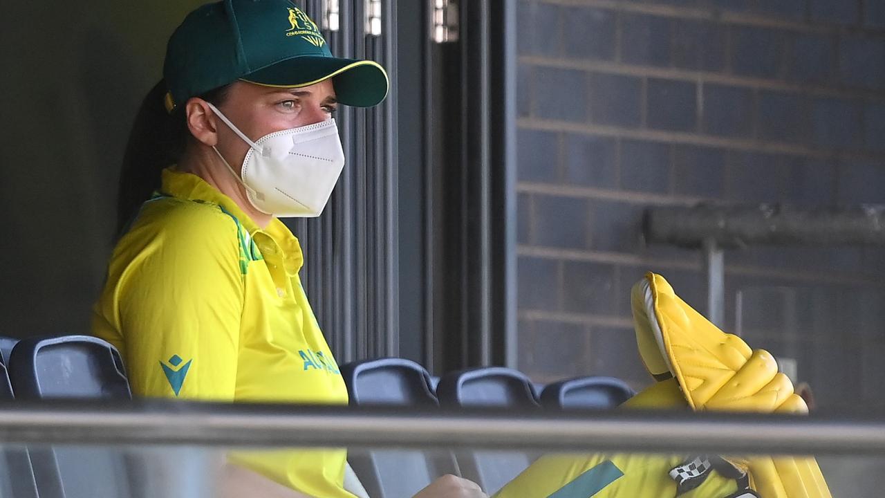 Tahlia McGrath of Team Australia looks on whilst wearing a face mask
