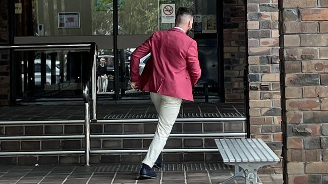 Sam Messina running into Port Kembla Local Court on Tuesday. Picture: Dylan Arvela