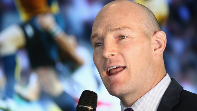 Former Wallabies captain Stirling Mortlock talks during a media launch.