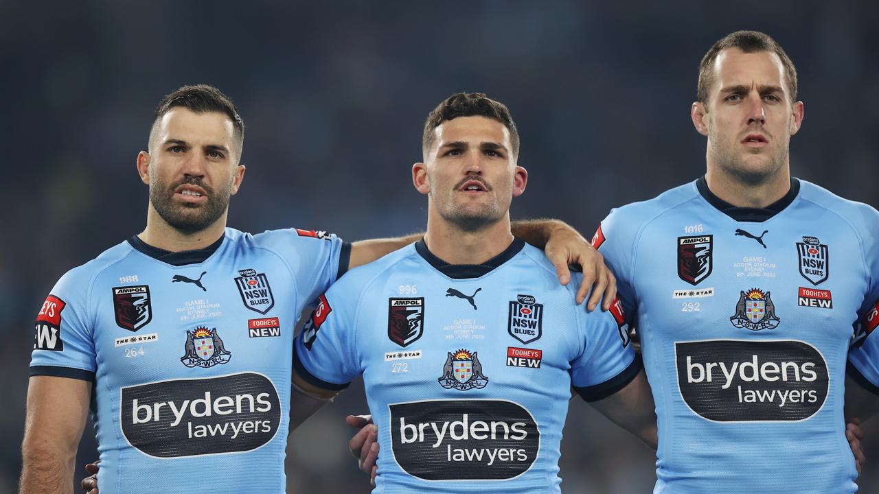 (L-R) James Tedesco, Nathan Cleary and Isaah Yeo of the Blues line up for the national anthem. (Photo by Mark Kolbe/Getty Images)